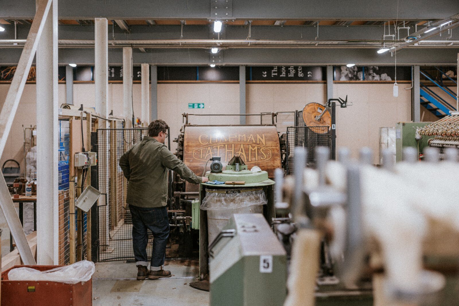 A heritage machine bearing the nameplate Chapman Tatham's, still in daily use on the mill floor